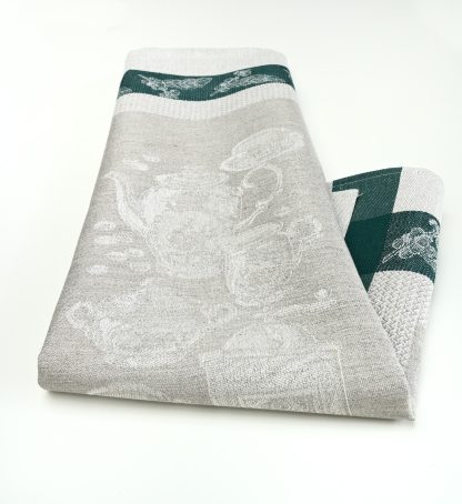Our Coffee themed tea towel is a beautiful damask woven kitchen towel. Dark green borders frame the coffee design and contrasts nicely with the natural background.
