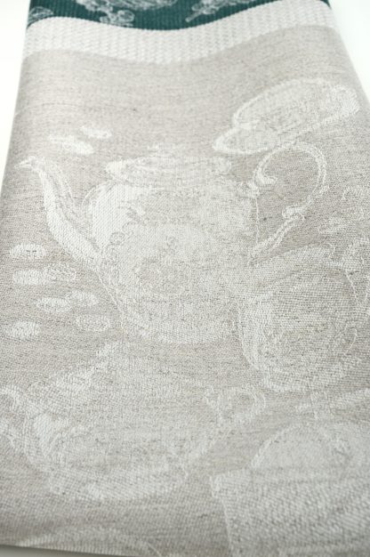 Our Coffee themed tea towel is a beautiful damask woven kitchen towel. Dark green borders frame the coffee design and contrasts nicely with the natural background.