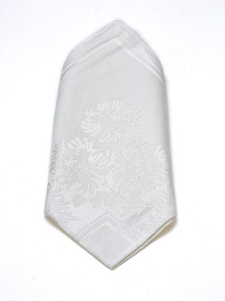 White dinner napkin with Contessa floral design.