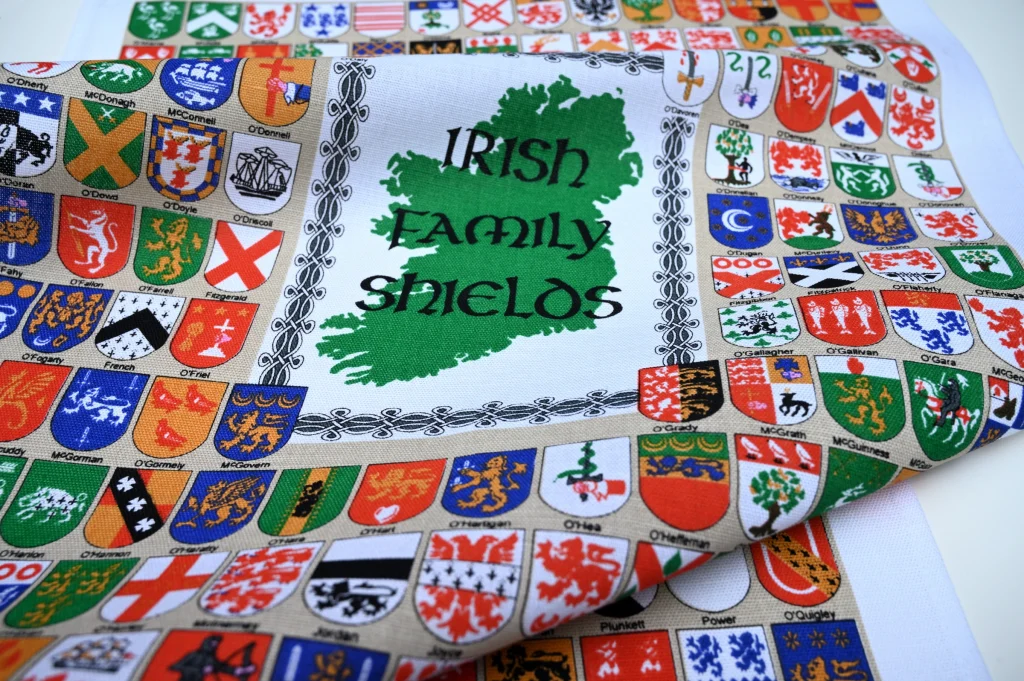 Irish Family Shields Tea Towel has all the family shields with coordinating surnames below.