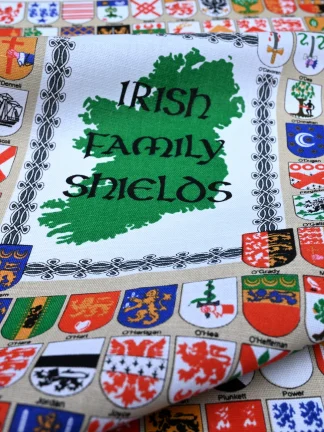 Irish Family Shields Tea Towel has all the family shields with coordinating surnames below.