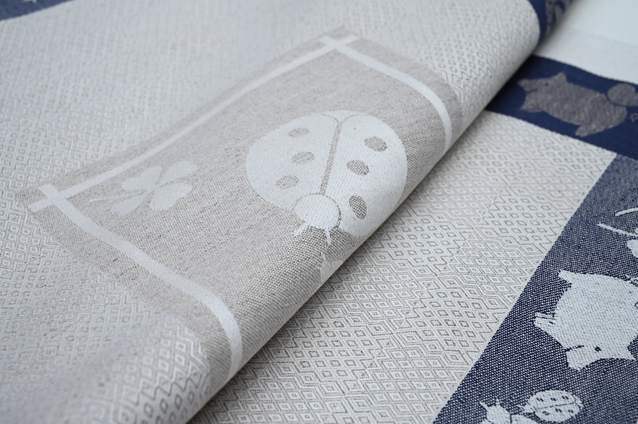 Blue and Natural flax color tea towel with ladybug design.
