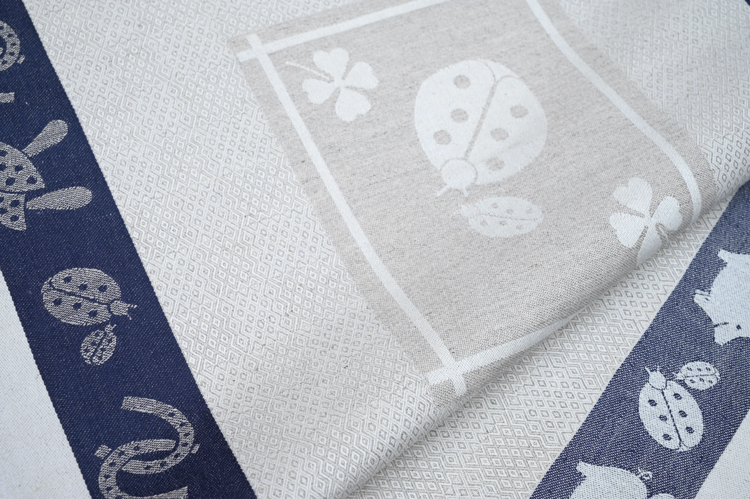 Blue and Natural flax color tea towel with ladybug design.