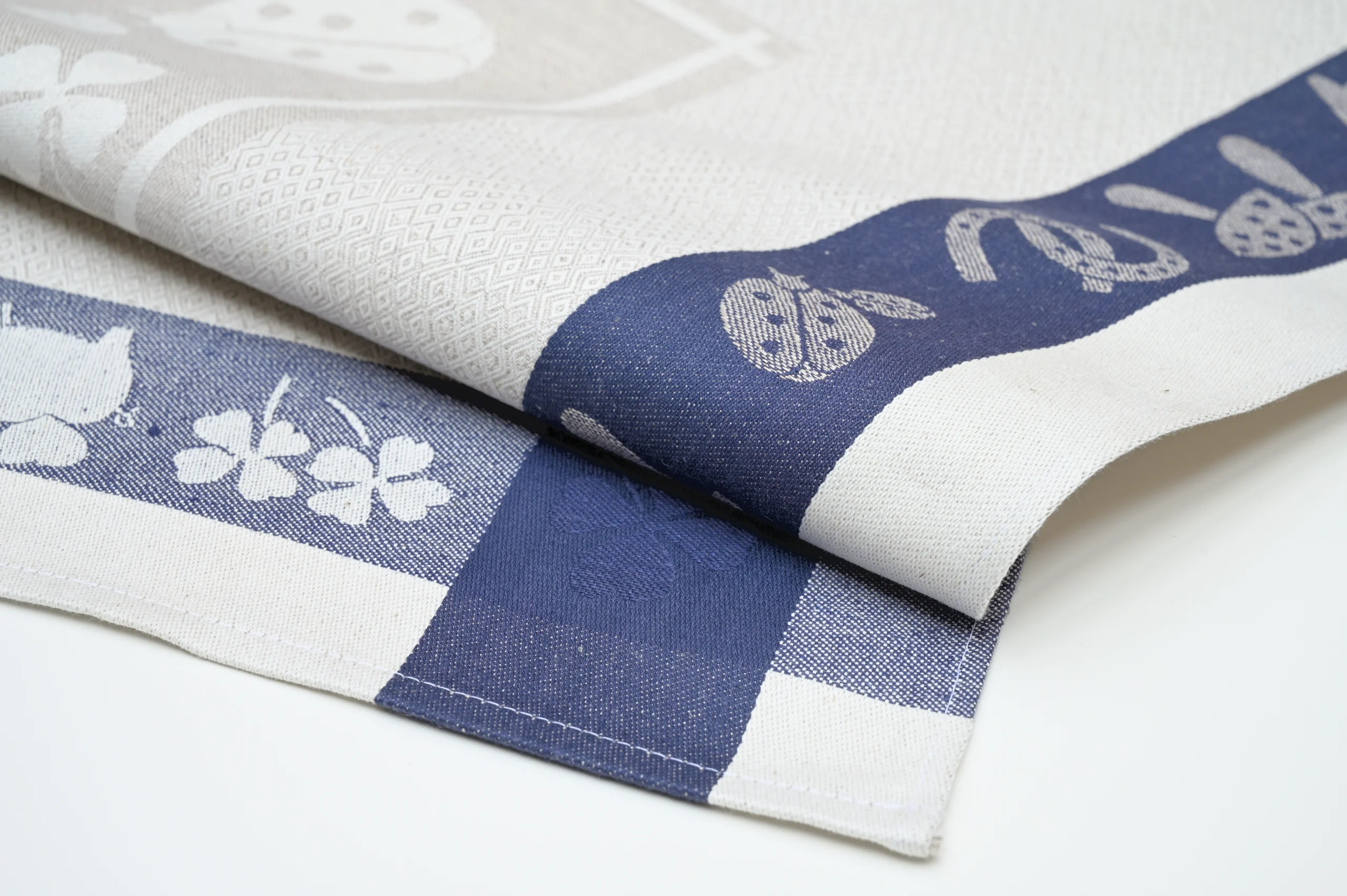 Blue and Natural flax color tea towel with ladybug design.